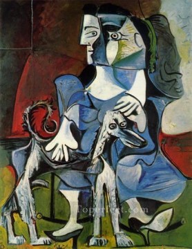 パブロ・ピカソ Painting - 犬を持つ女性 ジャクリーンとカブール 1962年 パブロ・ピカソ